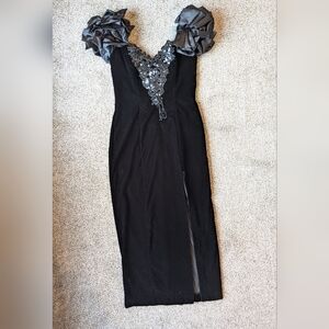 Zum Zum by Niki Livas Black V‑Neck Evening Gown with Satin Rosette Shoulders